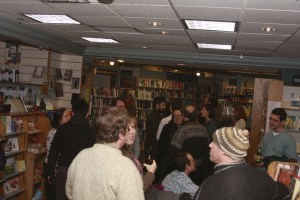 Chatting and having a grand old time. Yes we wear hats indoors -it's Maine.